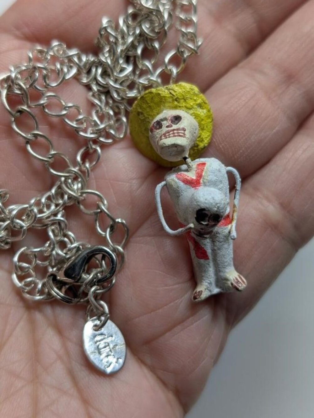 Claire's Vintage Halloween Skeleton Holding a Skull Pendant Necklace